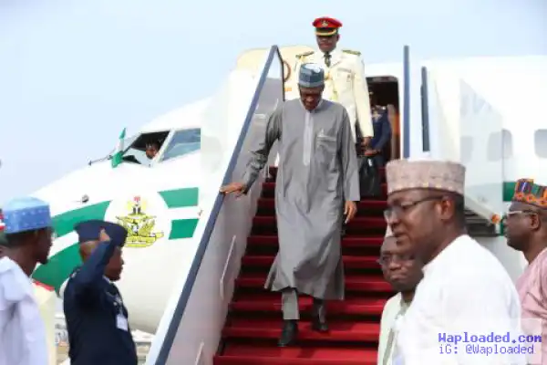 Photos: President Buhari Departs Qatar, Arrives Abuja